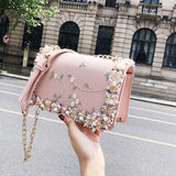 Mini bag fashion con piccoli motivi floreali per ragazza a tracolla in pizzo