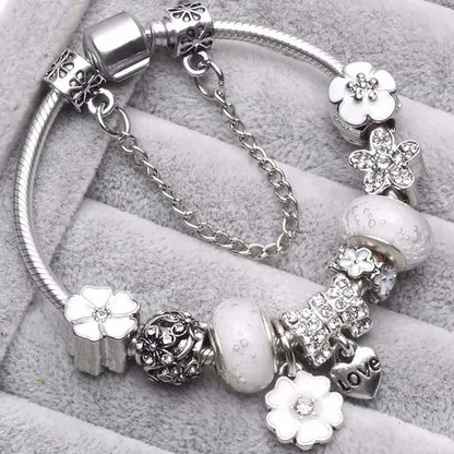 Bracciale donna delizioso con charms in 3 colori diversi