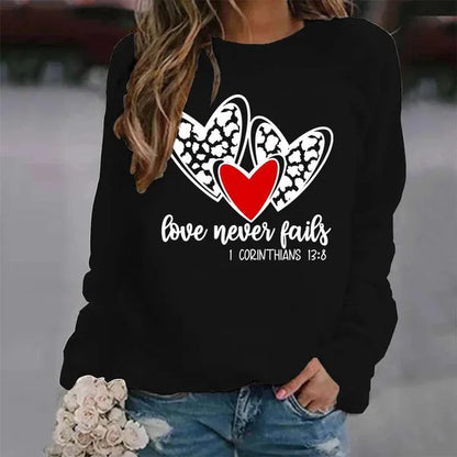 San Valentino Leopard Heart Love Never Fails Pullover stampato Moda Girocollo Top Donna Felpa senza cappuccio Felpa a maniche lunghe Autunno Casual Grafica Streetwear