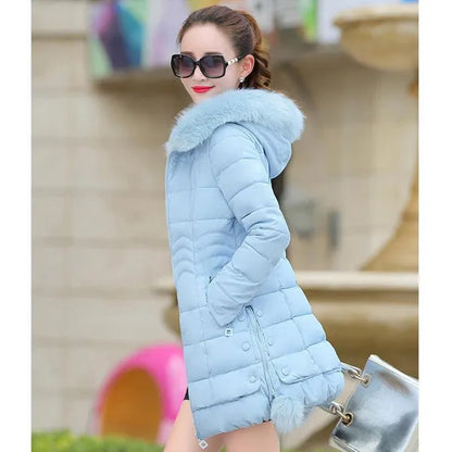 Piumino caldo con cappuccio da donna del nuovo inverno Versione coreana di vestiti imbottiti in cotone slim fit Lungo cappotto di riparazione del corpo di grandi dimensioni Piumino imbottito in cotone da donna Cappotto ispessito per donna