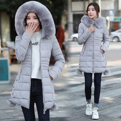 Piumino caldo con cappuccio da donna del nuovo inverno Versione coreana di vestiti imbottiti in cotone slim fit Lungo cappotto di riparazione del corpo di grandi dimensioni Piumino imbottito in cotone da donna Cappotto ispessito per donna